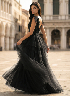 Jurk van tule met pailletten